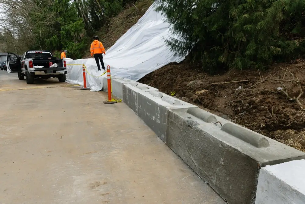 Completed site with barriers tarp and clear road